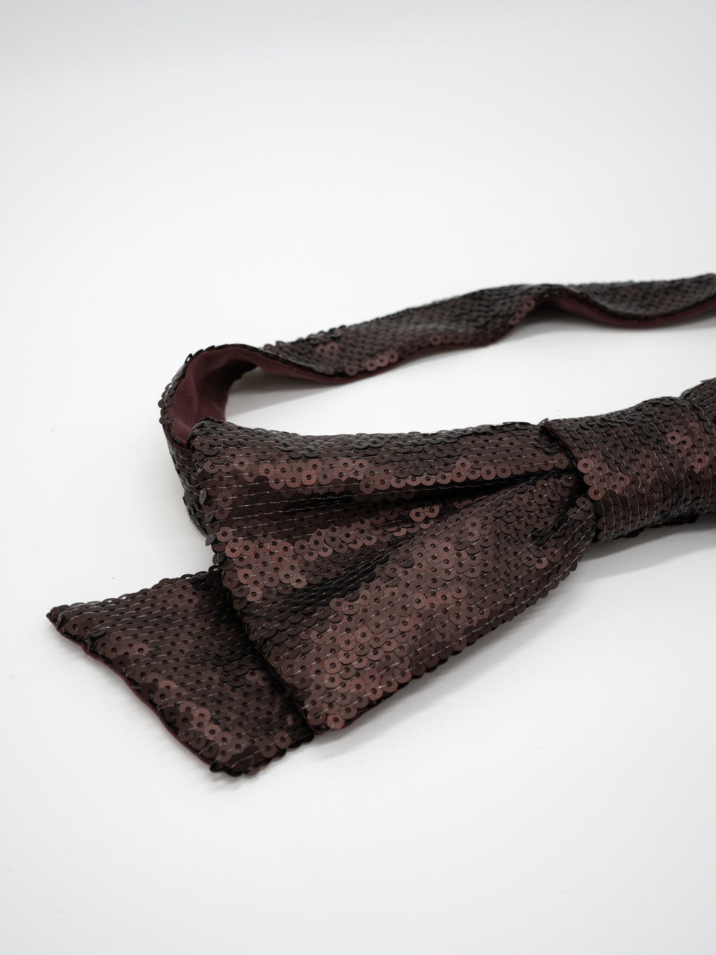 Kokardka na pasku z cekinów